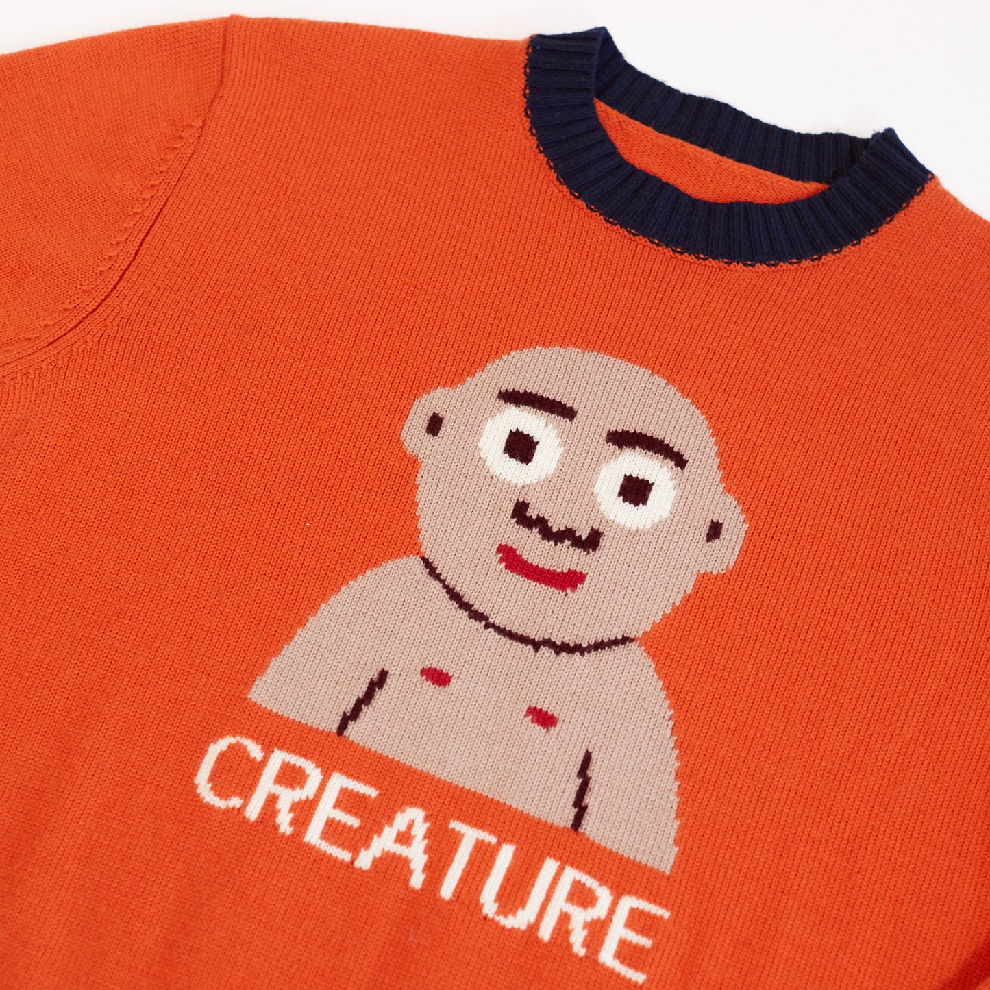 Orange "Creature" Sweater